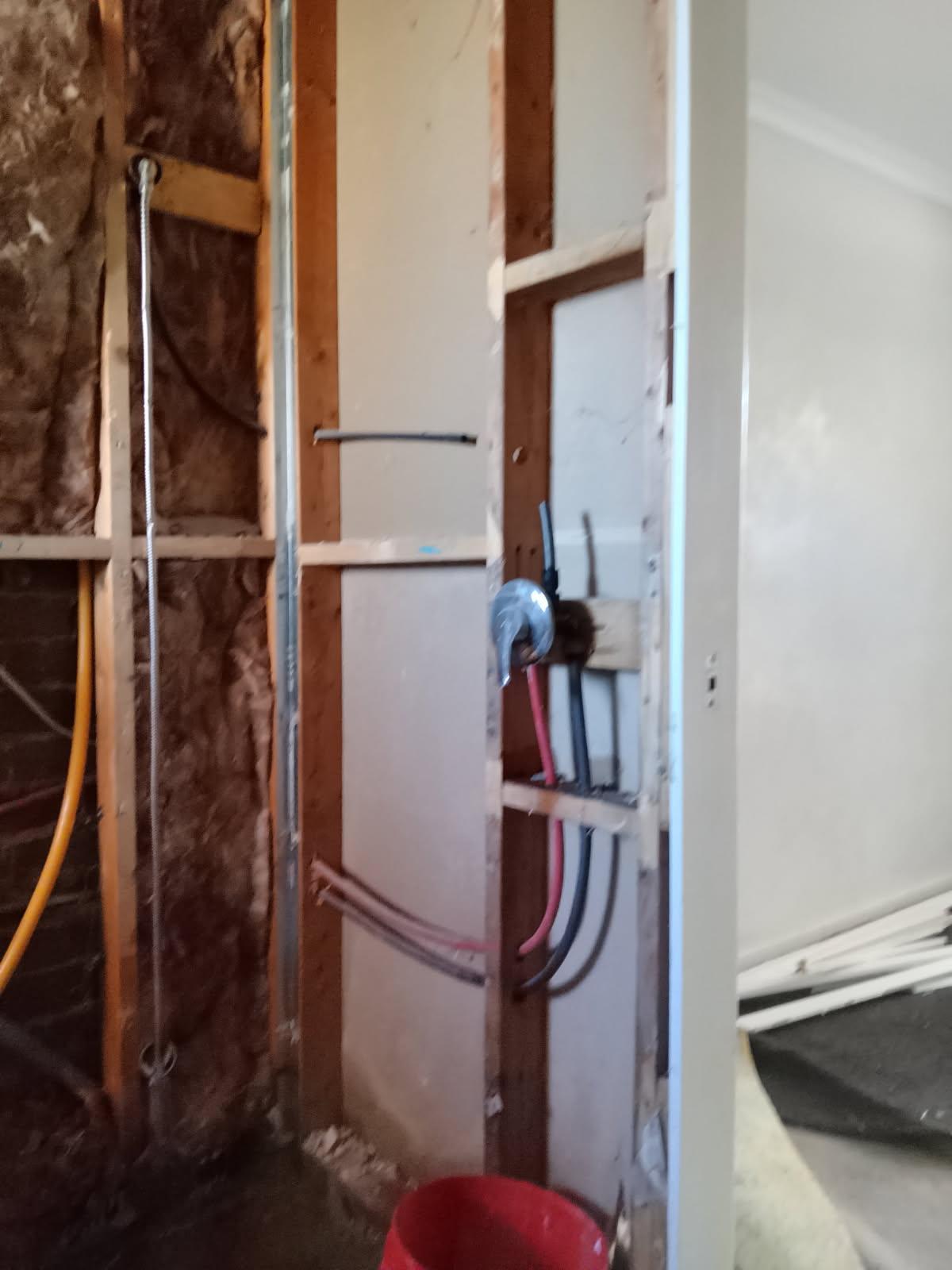Shower rough-in with tap set and capped lines during a Canberra bathroom renovation