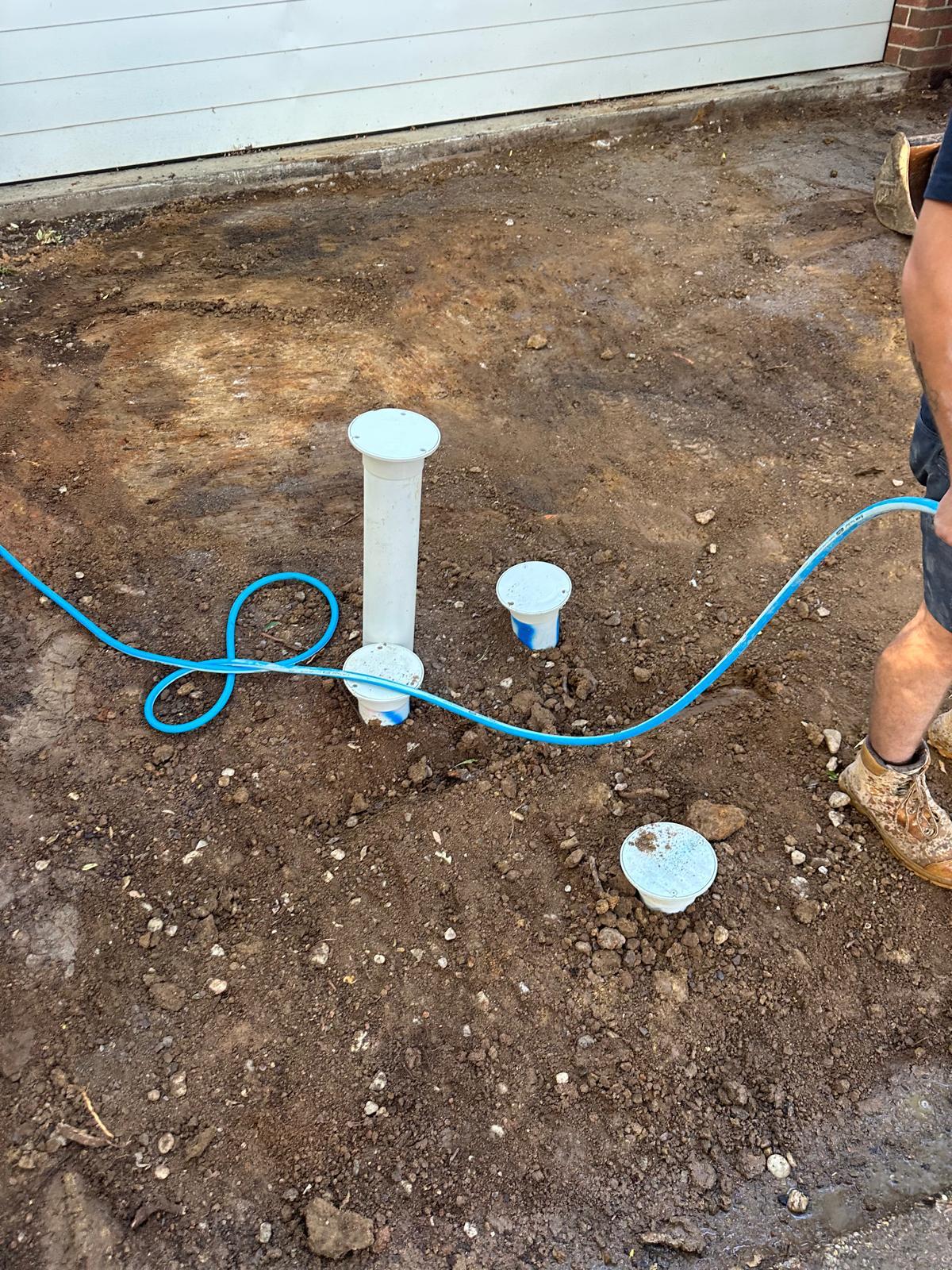 Close-up of sealed drainage inspection openings after a Canberra drain replacement
