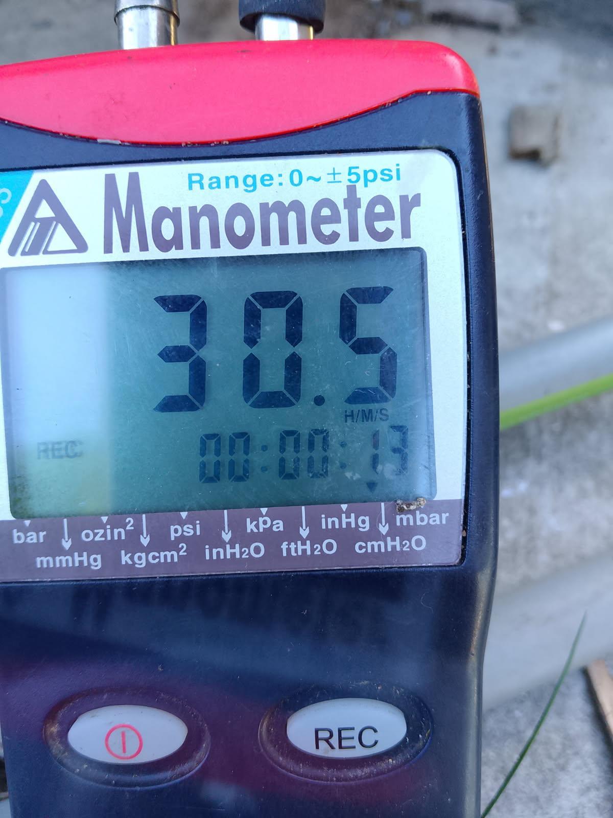 Gas manometer holding a 30.5 pressure reading during a compliance leak test in Canberra